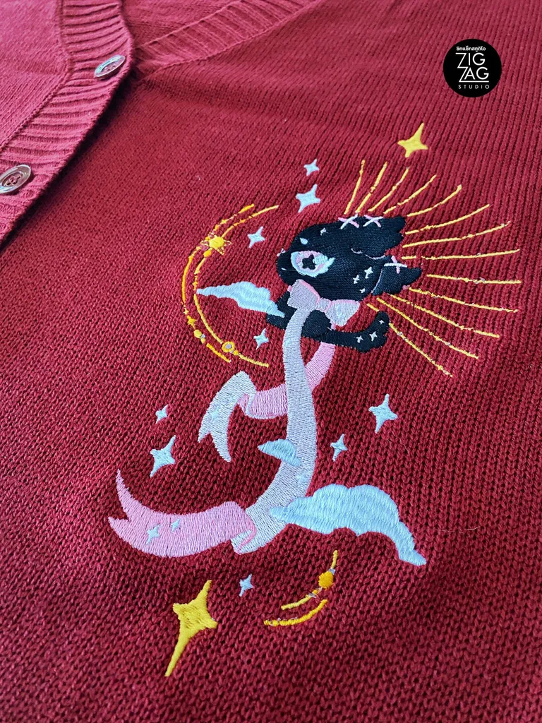 Figure motif on knit, where stitch density has to fall as the fabric stretches.